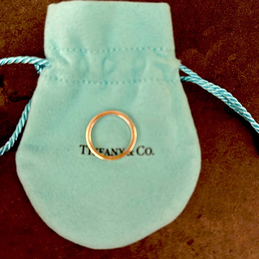Authentic Tiffany narrow notes ring size 6, inscribed with “I love you”
